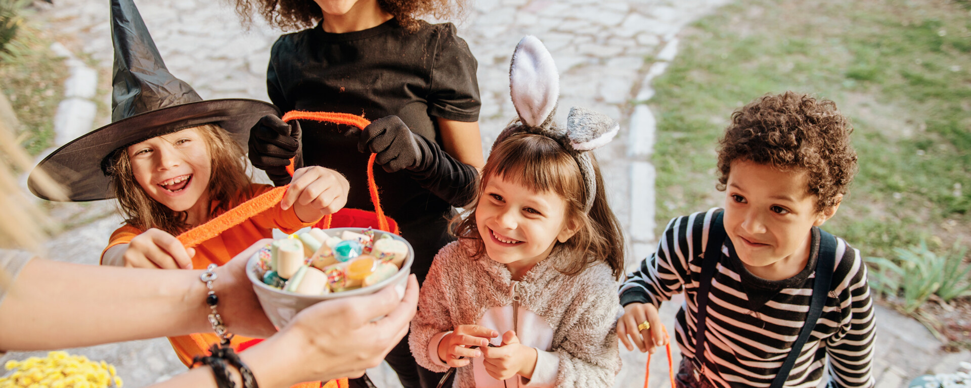 Children in Halloween costumes, trick or treating